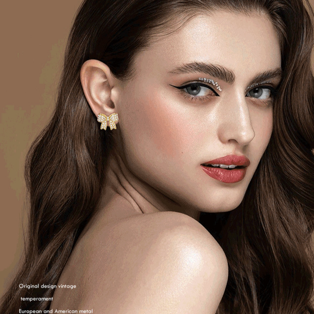 Fashion copper plated real gold inlaid zircon bow earrings temperament style exquisite female ear jewelry_voghion.com