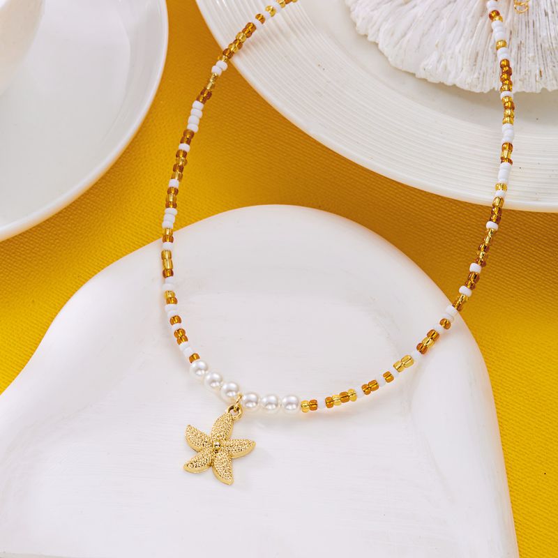 Collana girocollo con perle di riso semplici per donna, casual, versatile, da spiaggia, a forma di stella marina_voghion.com