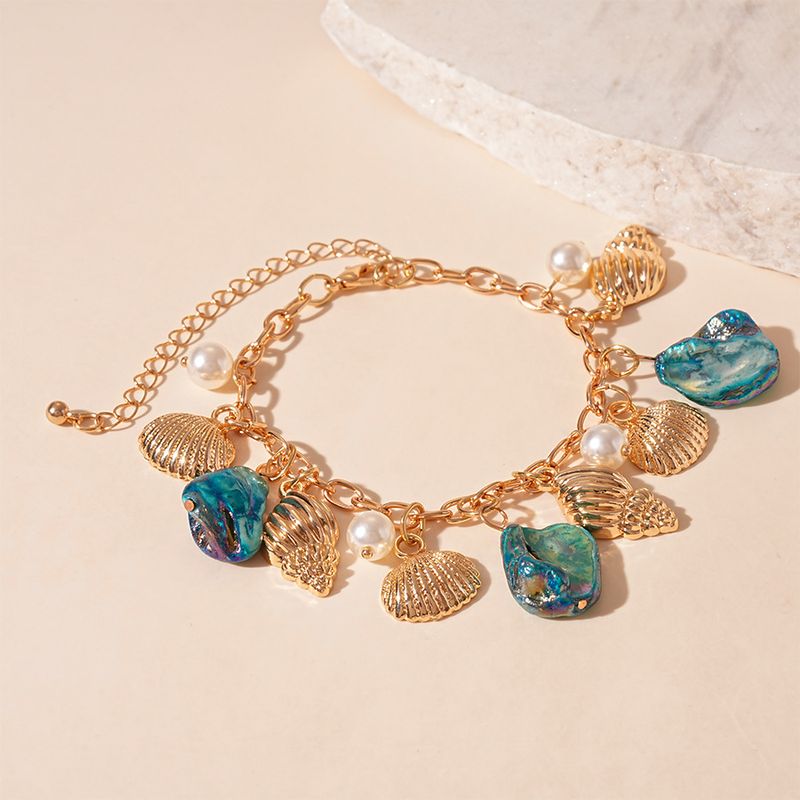 Bracciale in conchiglia di perle in stile vacanza al mare, unico, elegante, di alta gamma, per donna_voghion.com