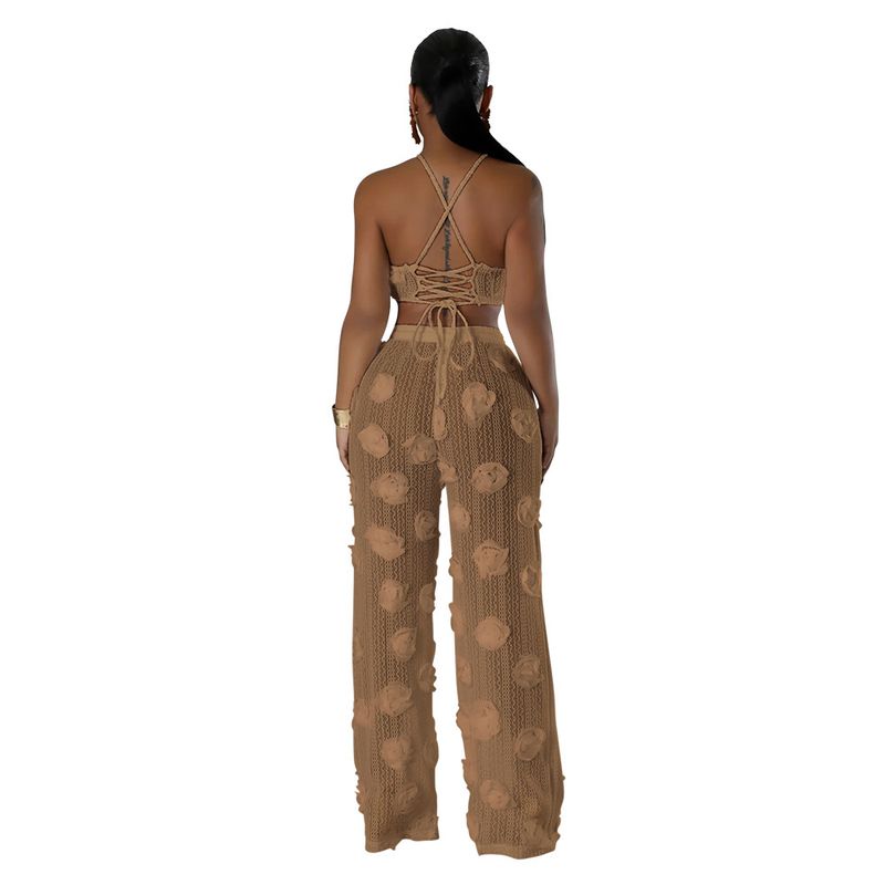 Completo due pezzi in tinta unita con top corto e pantaloni larghi e aderenti da donna_voghion.com