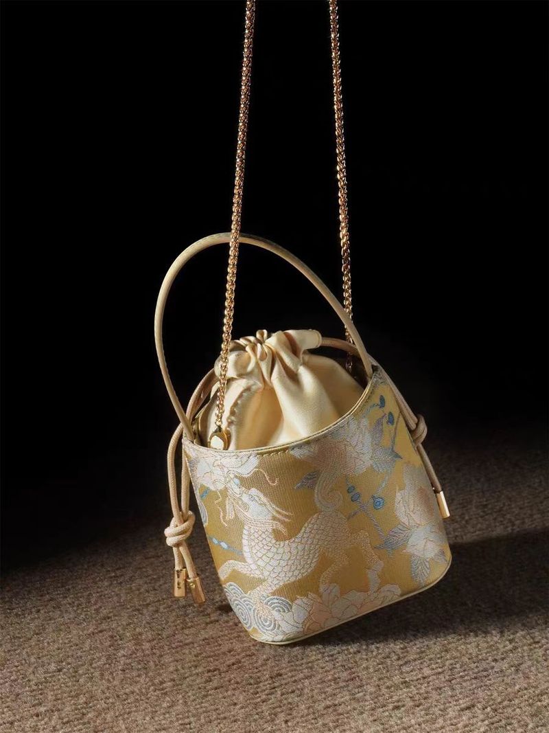 Borsa a secchiello portatile da donna in stile nazionale cinese Kirin Peony, mini 2025_voghion.com