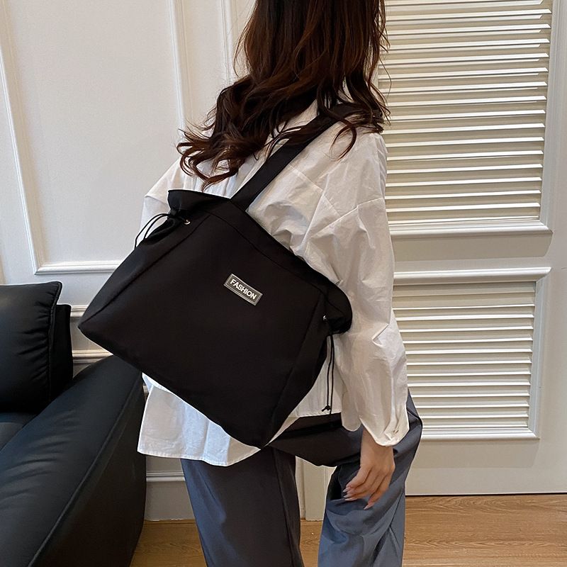 Borsa a tracolla in tessuto di nylon versatile, grande capacità, 2025, per la classe e per gli spostamenti quotidiani_voghion.com