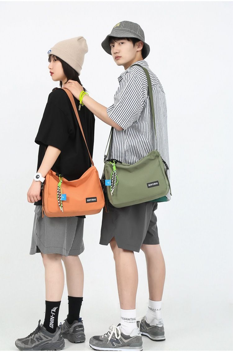 Umhängetasche für Herren Instagram Fashion Brand 2024 Neue große Kapazität Herrentasche Canvas Postman Bag Damen Single Shoulder Bag Japanische Serie_voghion.com