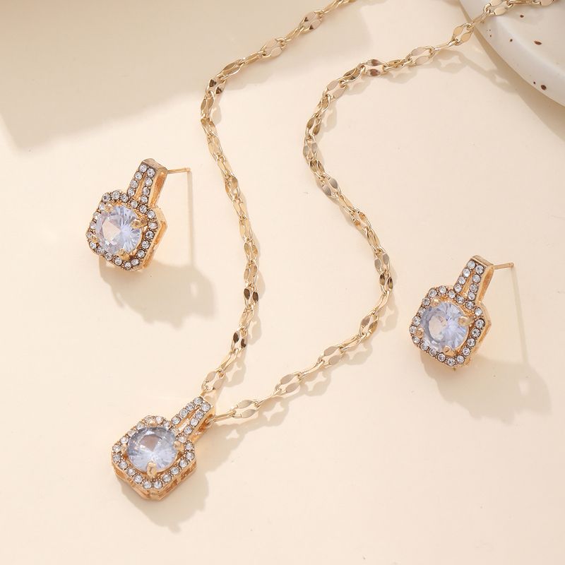 Ensemble élégant de boucles d'oreilles et collier en zircone géométrique, bijoux en alliage doré pour femme, pièce tendance à superposer_voghion.com