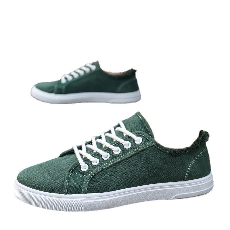 Scarpe da uomo in tela, scarpe bianche basse con suola morbida, alla moda e casual, con un solo piede, versione coreana per studenti, alla moda._voghion.com