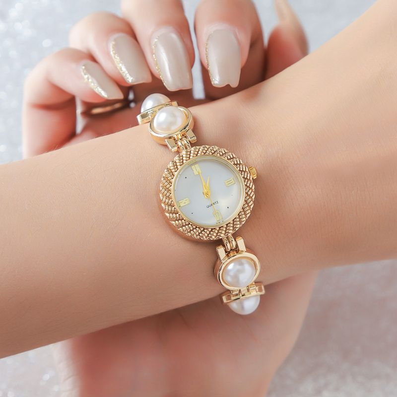 Nuovo stile, orologio al quarzo da donna, elegante, versatile, con bracciale di perle_voghion.com