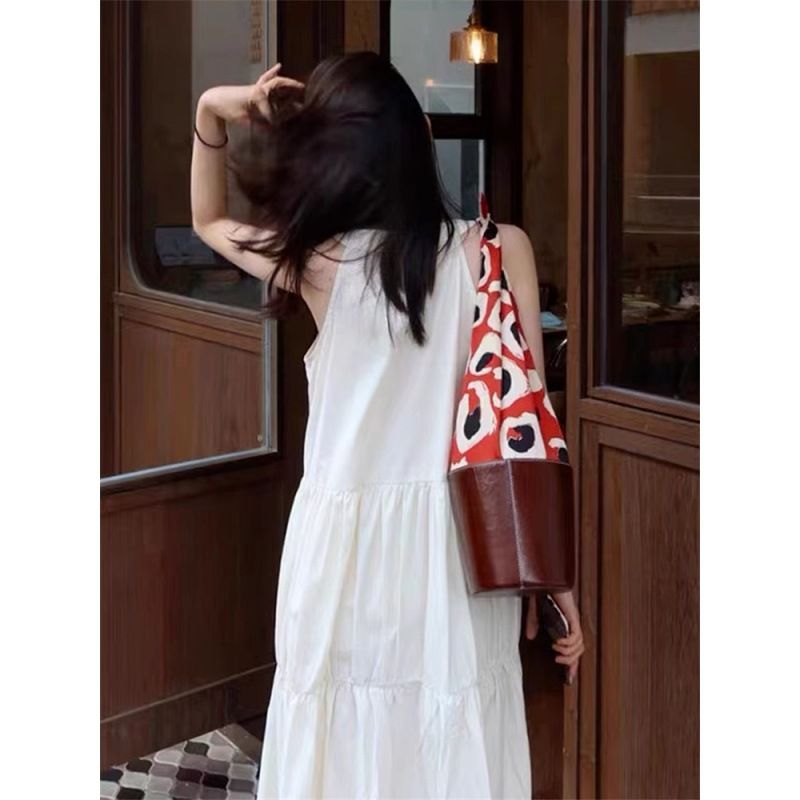 Abito lungo da donna bianco in stile francese Tea Break, estate 2025, con gilet e spalline da fata per le vacanze in spiaggia_voghion.com