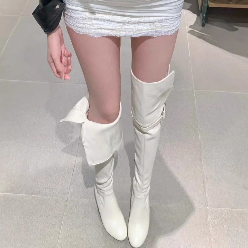 Bottes hautes à bout pointu et talon compensé, style rétro, collection automne 2025._voghion.com