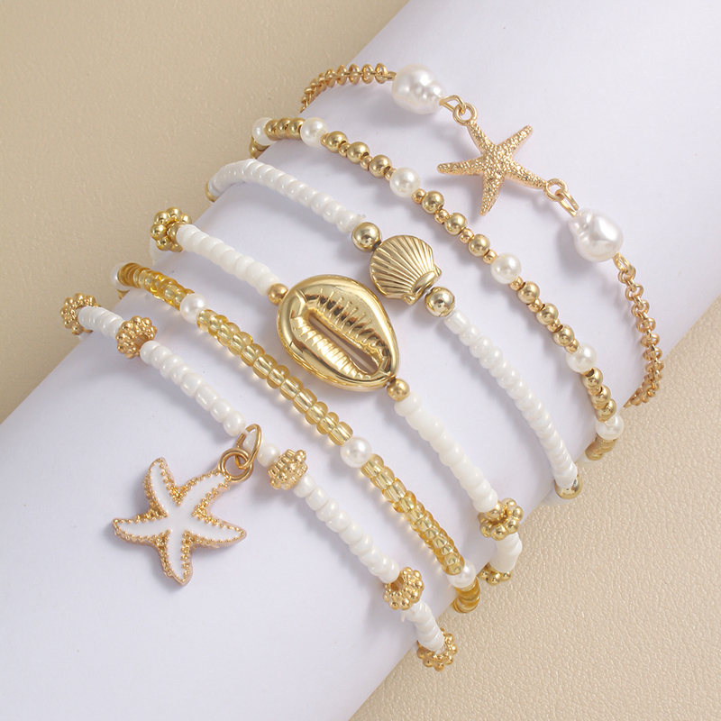 Set di braccialetti con perline a forma di stella marina per donna, alla moda, estivi, da spiaggia, multistrato, con perle impilate, gioielli da festa, regali_voghion.com