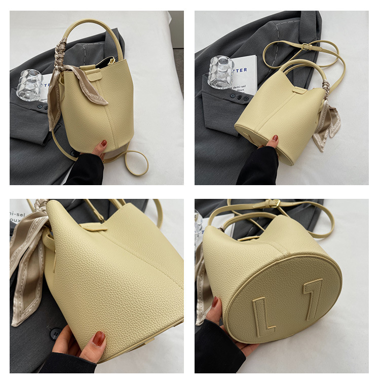 Trama di nicchia del designer, borsa a secchiello in tinta unita alla moda e versatile, borsa da donna portatile a tracolla diagonale con una spalla_voghion.com