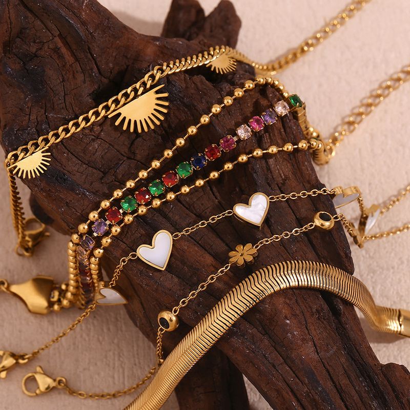 Fashion Niche Eleganter Handschmuck Edelstahl vergoldet dreilagiges Mikro-Intarsien-Herzblumenarmband für Damen_voghion.com