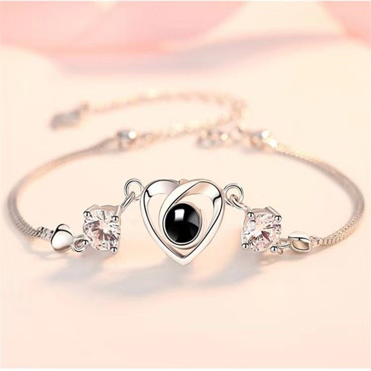 Nuovo bracciale Band S in argento con proiezione "Ti amo in 100 lingue" a forma di cuore, personalizzato per donna_voghion.com