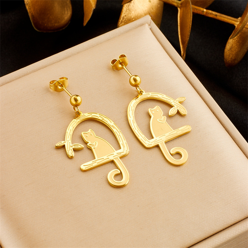 Fashion new simple temperament creative asymmetrical cute cat tree stand pattern pendant earrings_voghion.com