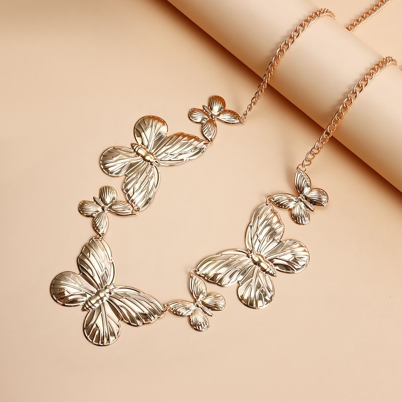 Biquíni de lazer com listras exageradas e corrente de cintura de borboleta, joia transfronteiriça europeia para primavera e verão, corrente de corpo de metal criativa para mulheres_voghion.com