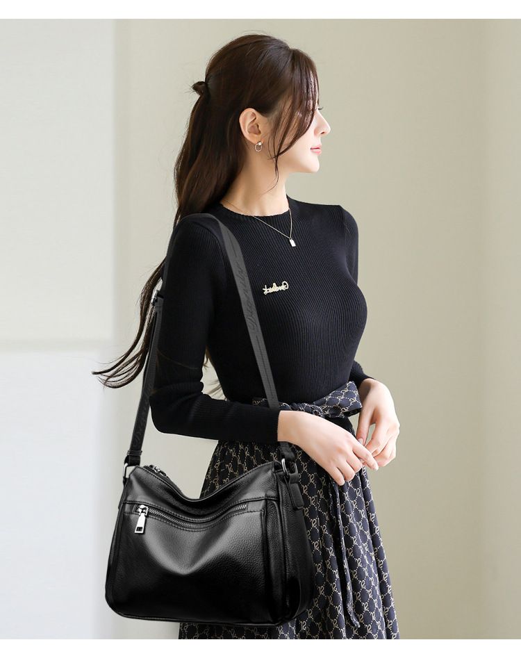 Borsa a tracolla da donna alla moda e versatile, con uno strato superiore in pelle bovina e tracolle larghe._voghion.com