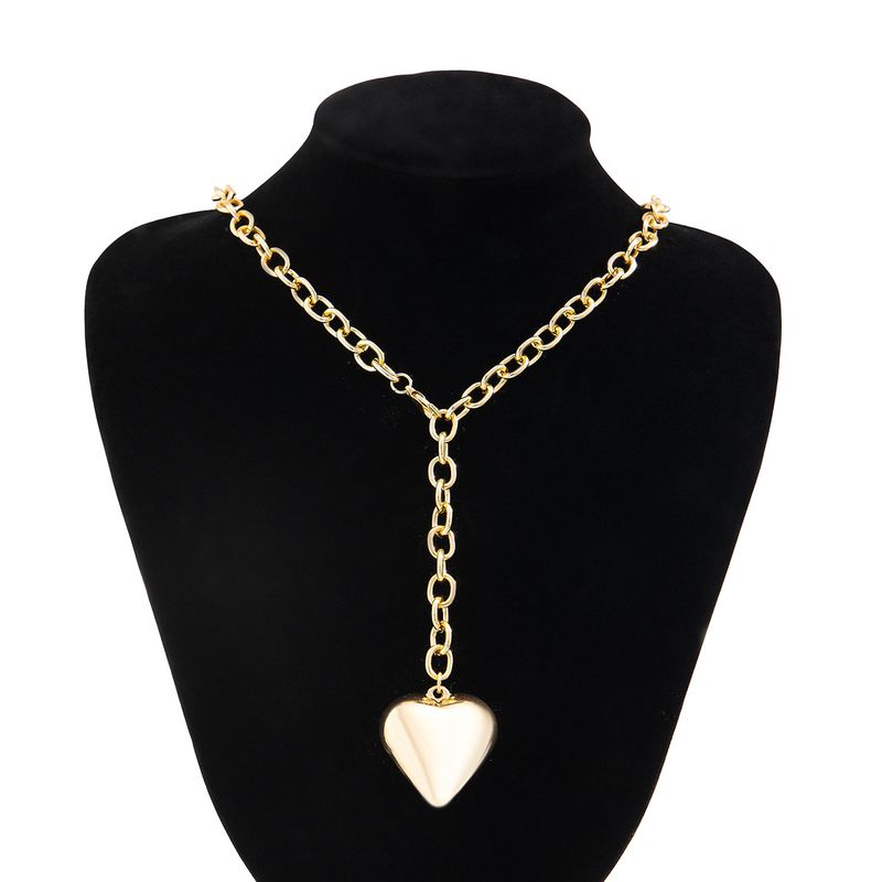 Collana da donna Collana dorata Collana con ciondolo Collana con ciondolo a forma di cuore in metallo dorato Collana con ciondolo a forma di cuore in stile casual Versatile catena per clavicola in acrilico_voghion.com