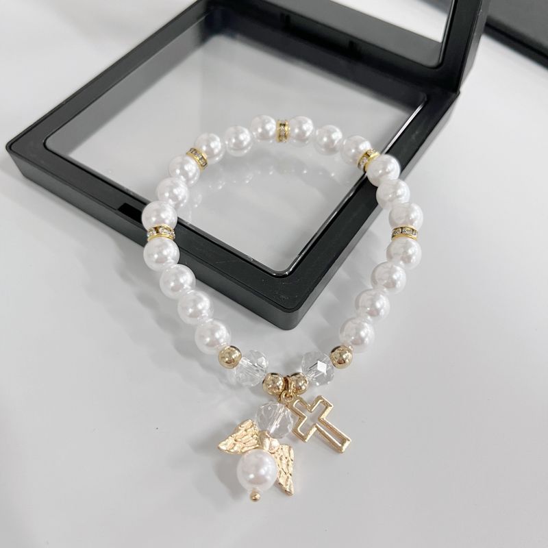 Pink White Artificial Pearl Hot Sale Hollow Cross Angel Accessories New Elastic Cord Bracelet_voghion.com