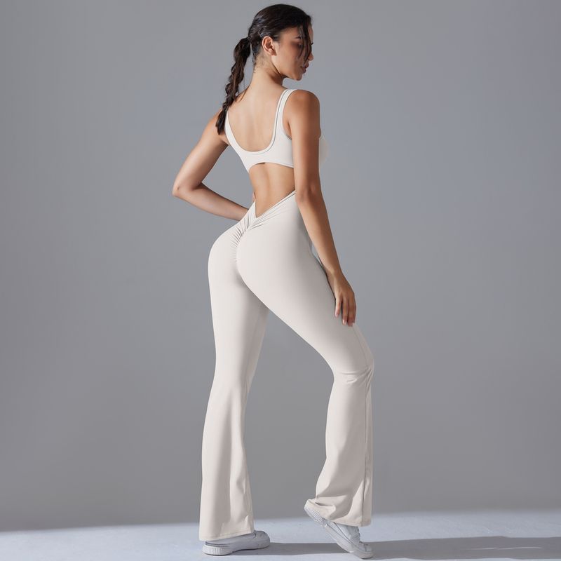 Neuer, einfarbiger, hüfthebender, langer, schmal geschnittener Jumpsuit mit weitem Bein für Sport, Laufen, Fitness und Yoga_voghion.com