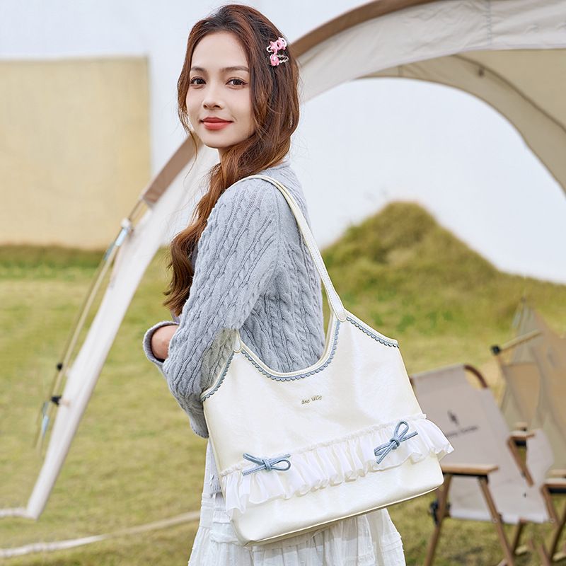 2025 Herbst und Winter Neue Damenhandtaschen Mehrzweck-Bogen-Unterarm-Pendler-Umhängetaschen für Damen Lässig und vielseitig_voghion.com