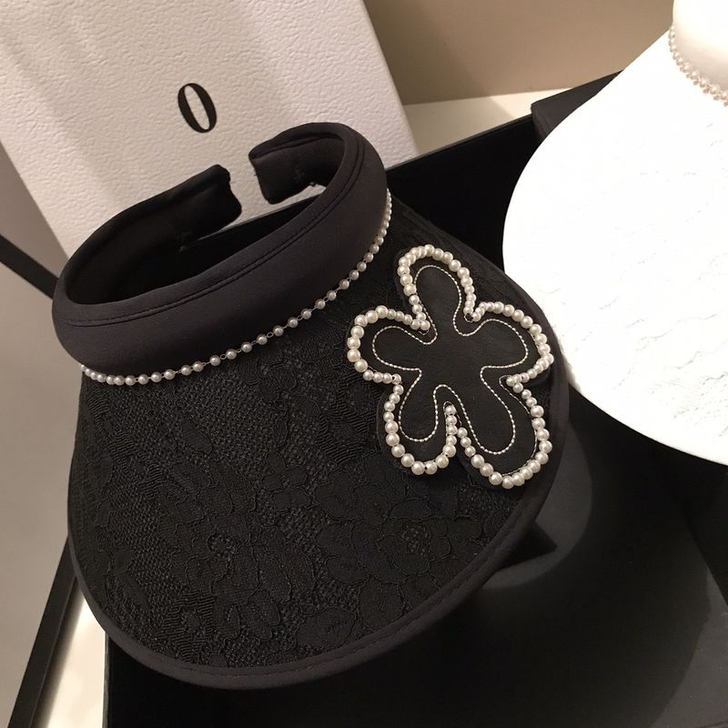 Top vuoto in stile forcina in pizzo jacquard coreano per viaggi estivi, parasole leggero con fiori di perle che riduce l'età e sole_voghion.com