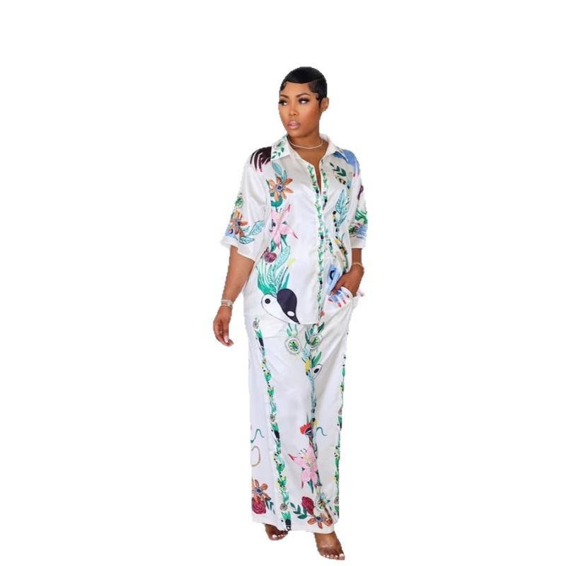 Completo casual da donna in due pezzi con camicia a maniche corte, pantaloni larghi e stampa in raso RC3327_voghion.com