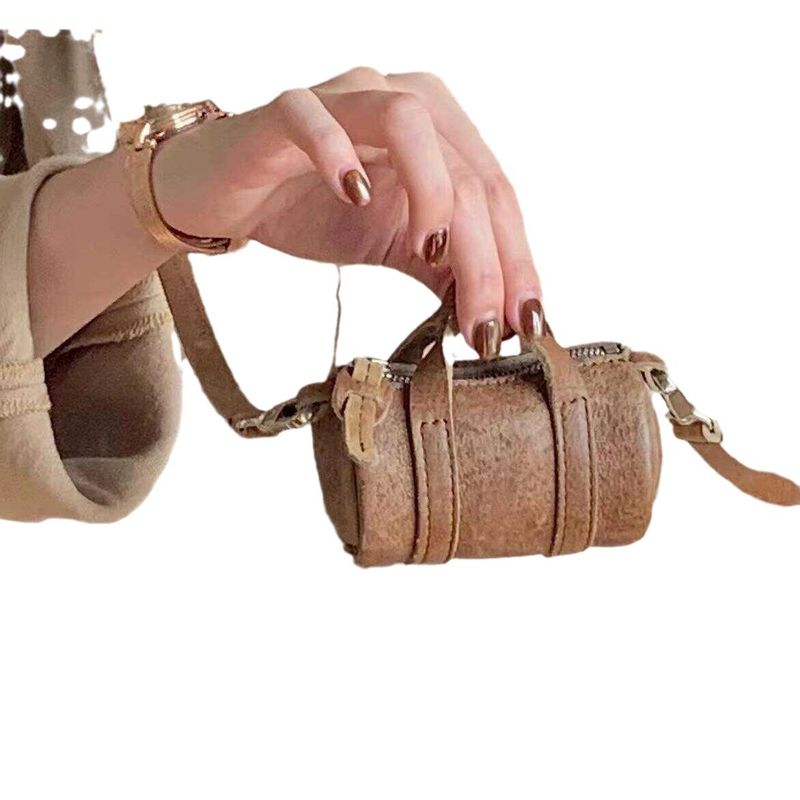 Braun 2024 Herbst Neue Exquisite Nischenhals Hängende High-End-Zylinder-Einzelschulter-Crossbody-Minitasche_voghion.com