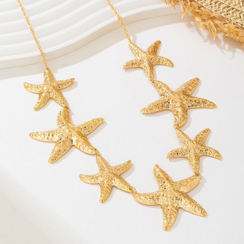 1 elegante e alla moda ciondolo a forma di stella marina in metallo della serie Ocean per donna_voghion.com