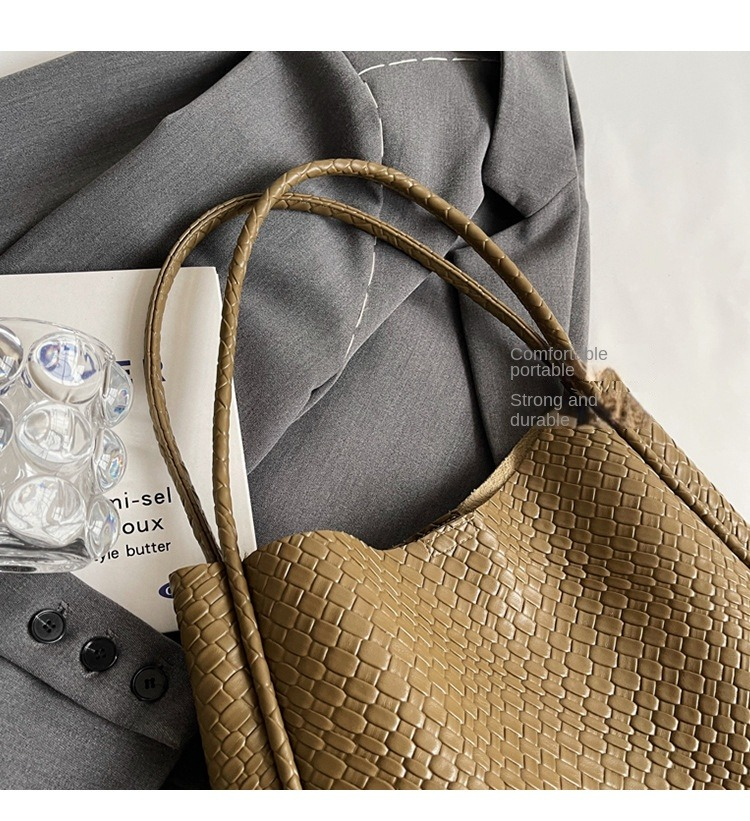 Europa och USA retro mode handhållen väska med stor kapacitet kvinnlig enkel Tote nisch textur axelväska_voghion.com