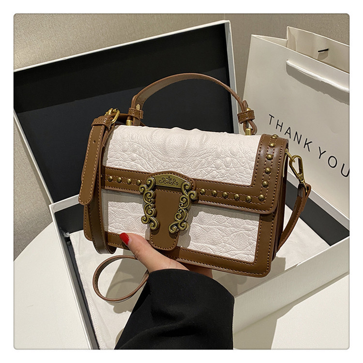 2023 neue heiße Verkaufs-Damentasche Retro Nische Eine Schultertasche Damen Vielseitige kleine quadratische Tasche Handheld Diagonal Straddle Bag_voghion.com