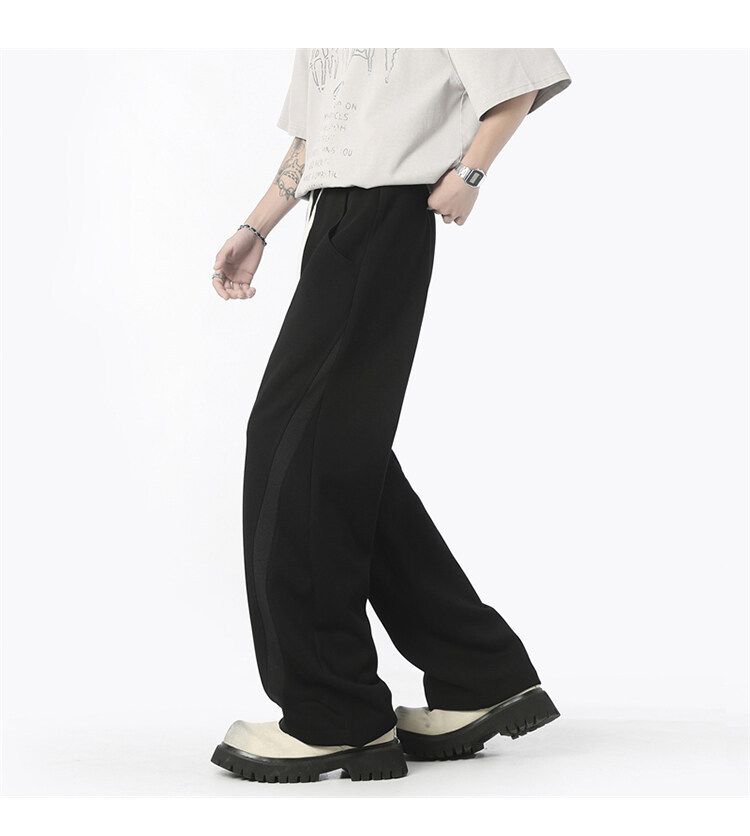 Jogginghose im dekonstruierten, einfarbigen Herrenstil – Cleanfit, lockere, gerade geschnittene Freizeit-Sweathose für Streetwear und den Alltag_voghion.com