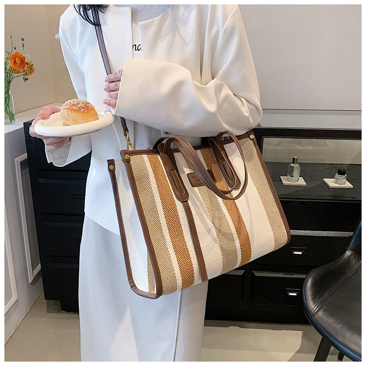 Nowa torba z grubej bawełny o dużej pojemności płócienna torba damska transgraniczny handel zagraniczny kontrastowy kolorowy pasek torba na ramię trend w modzie torba listonoszka_voghion.com