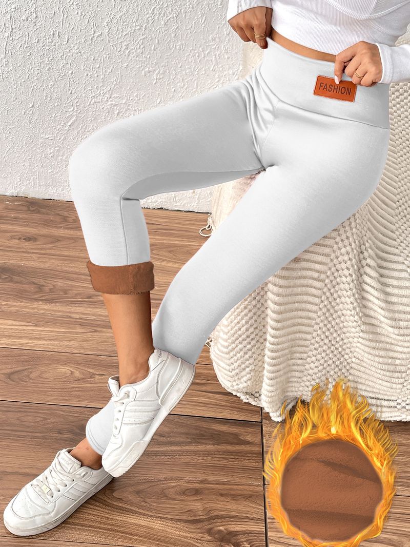 Pantaloni caldi in pelle di agnello color caffè per le donne in inverno, vita alta e snellenti con fodera in pile_voghion.com