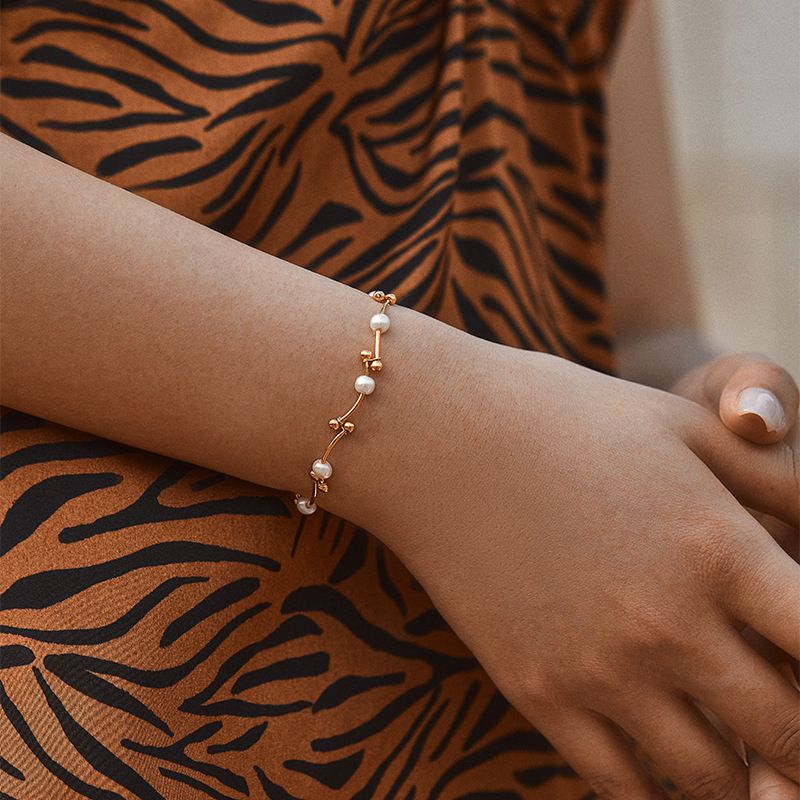 Perlenarmband Persönlichkeit geknotete goldene runde Perlen Kupferrohrdesign Handschnur Transferperlen Glücksbringer Handschmuck mit K Echtgold überzogen_voghion.com