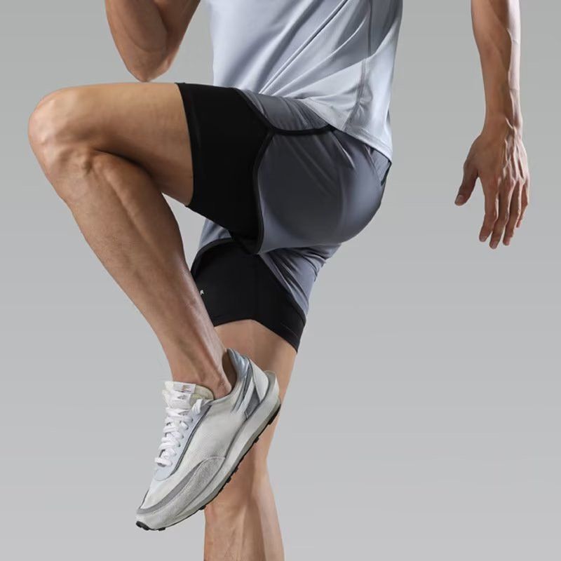 Herrenbekleidung Sportshorts Fitness Laufhose Gefüttert Mit Zweiteiligem Training Anti-Exposition Dreipunkt-Basketball Casual Shorts_voghion.com