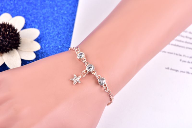 Fabrécksdirektverkaaf vun neien Diamantbecher hänkende fënnefzackige Stär Diamant Eenzelarmband Moud einfach Damen All-Match kleng frësch Versioun_voghion.com