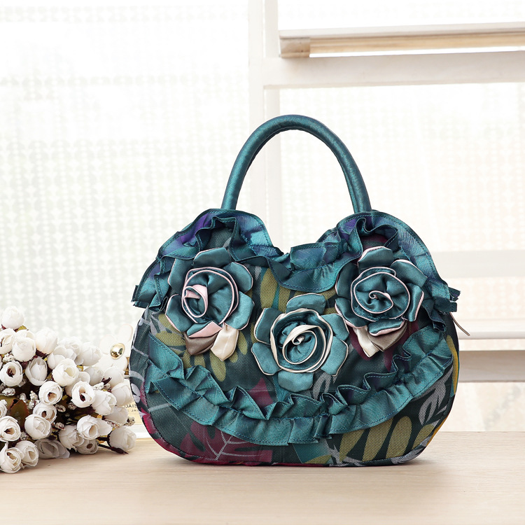 Mittelgroße neue Schlüsseltasche für Damen, koreanische Version der Damenhandtasche, einfarbige Damenhandtasche mit Reißverschluss aus Spitze._voghion.com