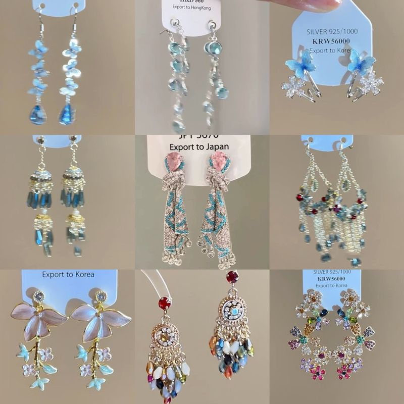 Orecchini versatili di alta moda di lusso con nappa di cristallo e fiore di diamanti intarsiati con ago d'argento_voghion.com