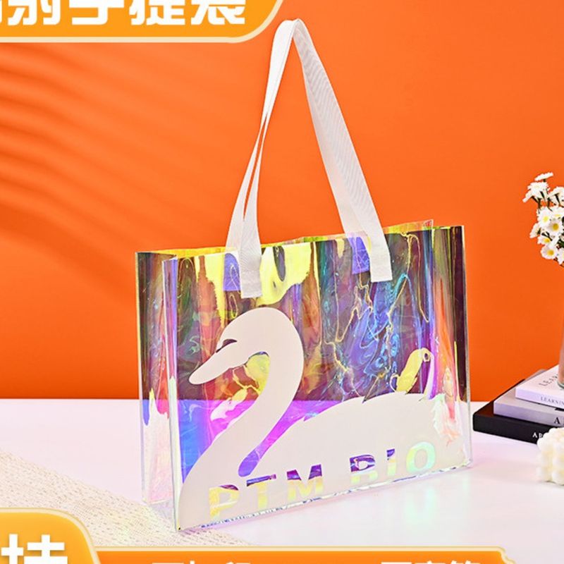Sac fourre-tout en PVC haut de gamme en plastique coloré imperméable à l'eau sac à bandoulière cadeau laser peut être utilisé_voghion.com