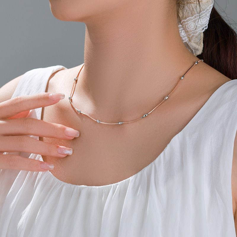 Nuova collana alla moda in stile europeo e americano in oro rosa con design semplice e di nicchia, con catena per clavicola e temperamento quotidiano._voghion.com