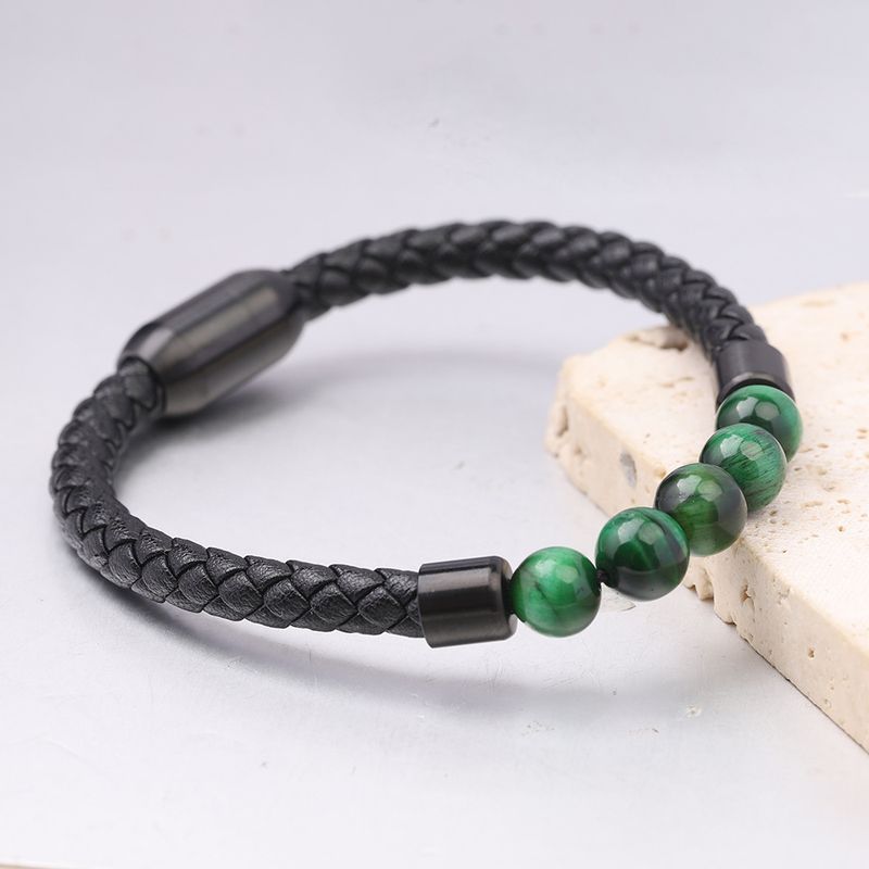 Pulsera trenzada de cuero vacuno con cierre magnético de ojo de tigre para hombre y mujer._voghion.com