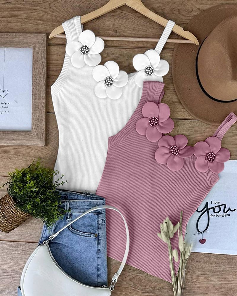 Abbigliamento da donna: top attillato a fiori con reggicalze_voghion.com