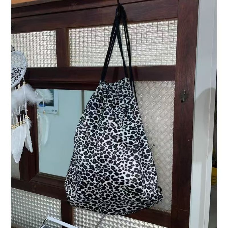 2025 Fall New Women's Drawstring Pocket Travel Bag Leopard Print Casual Backpack_voghion.com