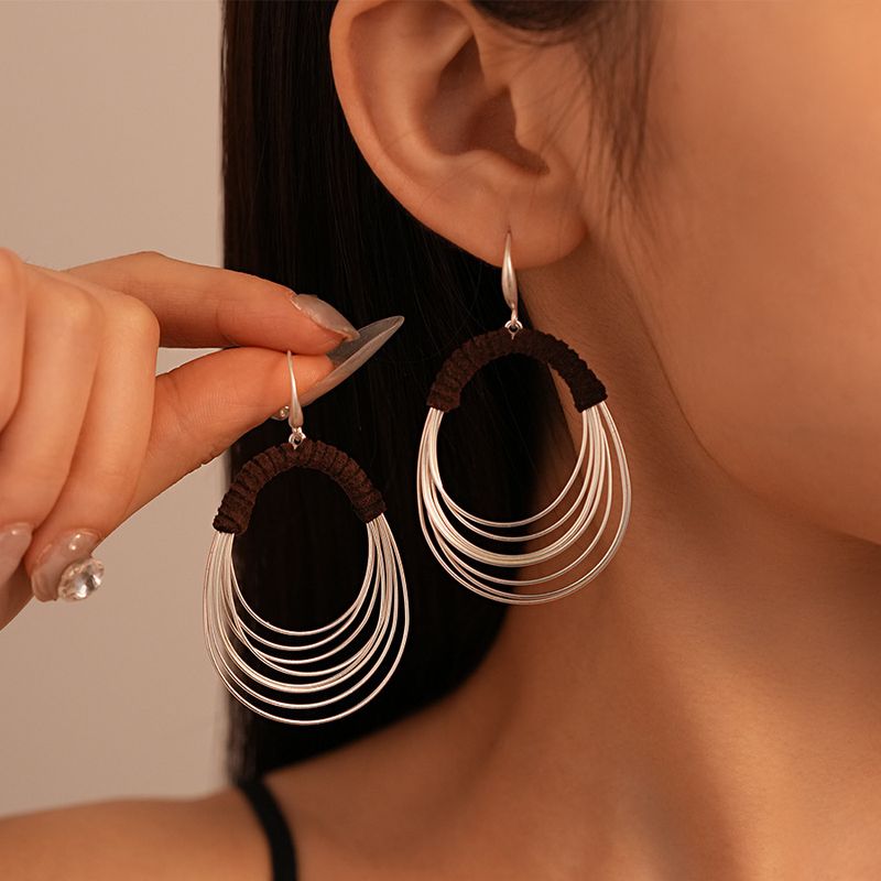 Exaggerated multi-layer circle ear hook personalized fabric winding geometric earrings_voghion.com