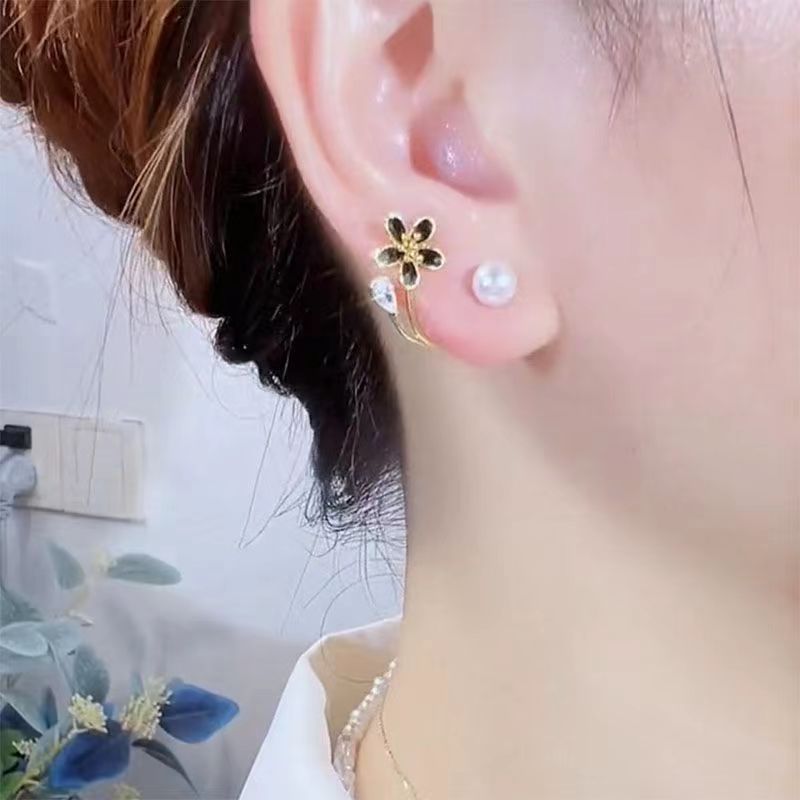 Women's earrings Unique flower pearl earrings for women 2023 new popular earrings niche design light luxury high-end temperament earrings_voghion.com