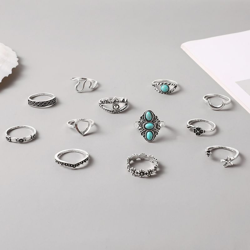 New Turquoise Crescent Carved Hollow 12 Piece Set Ring_voghion.com