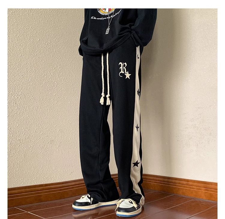Extra große kontrastierende Kordelzug-Sporthose mit Sternen für Männer und Frauen im Frühjahr 2024 im amerikanischen Trendy Brand_voghion.com