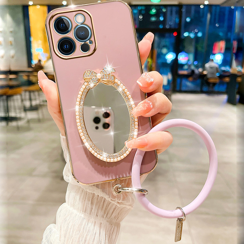 Custodia a specchio ovale con fiocco per Samsung A05S A73 A21S A34 A12 A54 A25 A33 A24 A32 5G A23 A53 A13 4G A14 A04S Braccialetto da polso_voghion.com