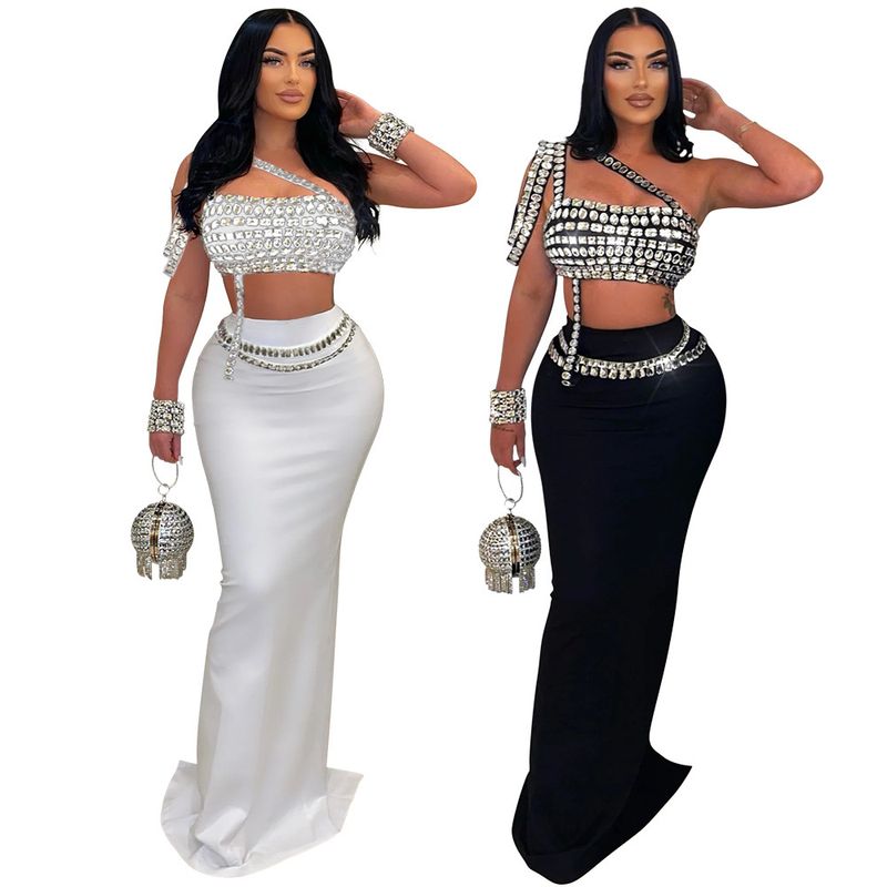 Abbigliamento da donna, nuovo top corto alla moda con diamanti e gonna sottile sui fianchi_voghion.com