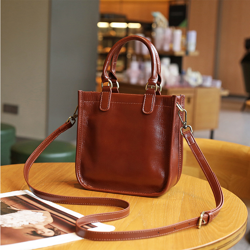 2023 Borsa a tracolla portatile alla moda in pelle di vacchetta da donna di fascia alta dal nuovo design di nicchia_voghion.com