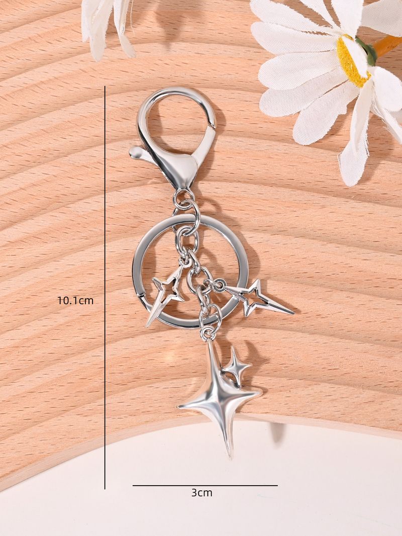 Colgante de llavero para coche con forma de estrella de cuatro puntas, estilo coreano, sencillo, ideal como regalo de San Valentín._voghion.com